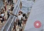 Image of Fighting fire on US Navy LST from kamikaze attack Pacific Theater, 1945, second 38 stock footage video 65675070702