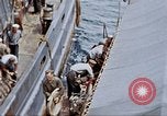 Image of Fighting fire on US Navy LST from kamikaze attack Pacific Theater, 1945, second 43 stock footage video 65675070702