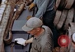 Image of Fighting fire on US Navy LST from kamikaze attack Pacific Theater, 1945, second 46 stock footage video 65675070702