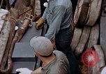 Image of Fighting fire on US Navy LST from kamikaze attack Pacific Theater, 1945, second 47 stock footage video 65675070702