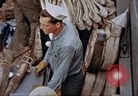 Image of Fighting fire on US Navy LST from kamikaze attack Pacific Theater, 1945, second 49 stock footage video 65675070702
