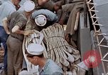 Image of Fighting fire on US Navy LST from kamikaze attack Pacific Theater, 1945, second 54 stock footage video 65675070702