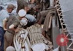 Image of Fighting fire on US Navy LST from kamikaze attack Pacific Theater, 1945, second 55 stock footage video 65675070702