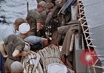 Image of Fighting fire on US Navy LST from kamikaze attack Pacific Theater, 1945, second 56 stock footage video 65675070702