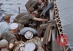 Image of Fighting fire on US Navy LST from kamikaze attack Pacific Theater, 1945, second 57 stock footage video 65675070702