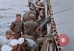 Image of Fighting fire on US Navy LST from kamikaze attack Pacific Theater, 1945, second 61 stock footage video 65675070702