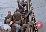 Image of Fighting fire on US Navy LST from kamikaze attack Pacific Theater, 1945, second 62 stock footage video 65675070702