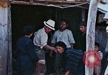 Standbild Rehabilitation von Einheimischen Okinawa Ryukyu Inseln, 1945, aus Sekunde 15 historischem Filmmaterial Videoclip 65675070758