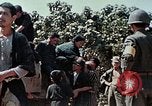 Standbild Rehabilitation von Einheimischen Okinawa Ryukyu Inseln, 1945, aus Sekunde 56 historischem Filmmaterial Videoclip 65675070758