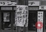 Image of hanging clothes Japan, 1949, second 41 stock footage video 65675070814