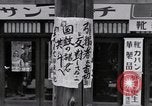 Image of hanging clothes Japan, 1949, second 46 stock footage video 65675070814