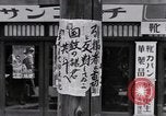 Image of hanging clothes Japan, 1949, second 50 stock footage video 65675070814