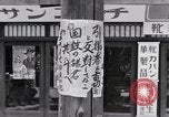 Image of hanging clothes Japan, 1949, second 51 stock footage video 65675070814