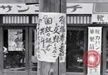 Image of hanging clothes Japan, 1949, second 52 stock footage video 65675070814