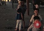 Image of Ethnic Vietnamese refugees Cambodia, 1970, second 29 stock footage video 65675070851
