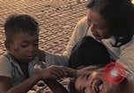 Image of Ethnic Vietnamese refugees Cambodia, 1970, second 50 stock footage video 65675070851