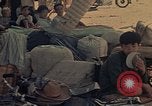 Image of Ethnic Vietnamese refugees Cambodia, 1970, second 57 stock footage video 65675070851