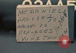 Image of ethnic Vietnamese fleeing Cambodia Vung Tau Vietnam, 1970, second 4 stock footage video 65675070855