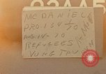 Image of ethnic Vietnamese fleeing Cambodia Vung Tau Vietnam, 1970, second 5 stock footage video 65675070855