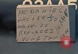 Image of ethnic Vietnamese fleeing Cambodia Vung Tau Vietnam, 1970, second 7 stock footage video 65675070855