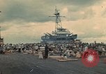 Image of ethnic Vietnamese fleeing Cambodia Vung Tau Vietnam, 1970, second 17 stock footage video 65675070855