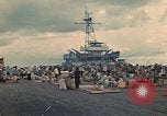 Image of ethnic Vietnamese fleeing Cambodia Vung Tau Vietnam, 1970, second 21 stock footage video 65675070855