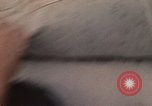 Image of ethnic Vietnamese fleeing Cambodia Vung Tau Vietnam, 1970, second 27 stock footage video 65675070855
