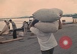 Image of ethnic Vietnamese fleeing Cambodia Vung Tau Vietnam, 1970, second 29 stock footage video 65675070855