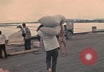 Image of ethnic Vietnamese fleeing Cambodia Vung Tau Vietnam, 1970, second 30 stock footage video 65675070855