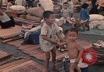 Image of ethnic Vietnamese fleeing Cambodia Vung Tau Vietnam, 1970, second 35 stock footage video 65675070855