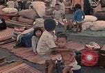 Image of ethnic Vietnamese fleeing Cambodia Vung Tau Vietnam, 1970, second 36 stock footage video 65675070855