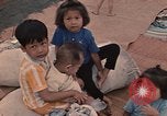 Image of ethnic Vietnamese fleeing Cambodia Vung Tau Vietnam, 1970, second 37 stock footage video 65675070855