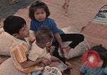 Image of ethnic Vietnamese fleeing Cambodia Vung Tau Vietnam, 1970, second 39 stock footage video 65675070855