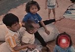 Image of ethnic Vietnamese fleeing Cambodia Vung Tau Vietnam, 1970, second 43 stock footage video 65675070855