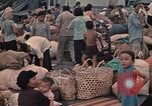 Image of ethnic Vietnamese fleeing Cambodia Vung Tau Vietnam, 1970, second 44 stock footage video 65675070855
