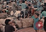 Image of ethnic Vietnamese fleeing Cambodia Vung Tau Vietnam, 1970, second 48 stock footage video 65675070855