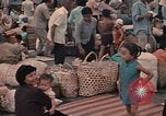 Image of ethnic Vietnamese fleeing Cambodia Vung Tau Vietnam, 1970, second 49 stock footage video 65675070855