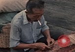 Image of ethnic Vietnamese fleeing Cambodia Vung Tau Vietnam, 1970, second 52 stock footage video 65675070855