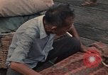 Image of ethnic Vietnamese fleeing Cambodia Vung Tau Vietnam, 1970, second 54 stock footage video 65675070855