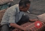 Image of ethnic Vietnamese fleeing Cambodia Vung Tau Vietnam, 1970, second 57 stock footage video 65675070855