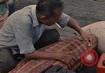 Image of ethnic Vietnamese fleeing Cambodia Vung Tau Vietnam, 1970, second 59 stock footage video 65675070855