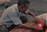 Image of ethnic Vietnamese fleeing Cambodia Vung Tau Vietnam, 1970, second 60 stock footage video 65675070855