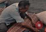 Image of ethnic Vietnamese fleeing Cambodia Vung Tau Vietnam, 1970, second 61 stock footage video 65675070855