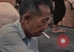 Image of ethnic Vietnamese fleeing Cambodia Vung Tau Vietnam, 1970, second 62 stock footage video 65675070855