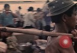 Image of Arrival of Vietnamese refugees from Cambodia Vung Tau Vietnam, 1970, second 59 stock footage video 65675070856