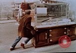 Image of looting of Wolfe Bros. furniture store during riots Washington DC USA, 1968, second 10 stock footage video 65675070916