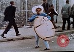 Image of looting of Wolfe Bros. furniture store during riots Washington DC USA, 1968, second 21 stock footage video 65675070916