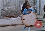 Image of looting of Wolfe Bros. furniture store during riots Washington DC USA, 1968, second 22 stock footage video 65675070916