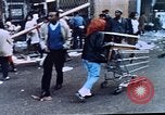Image of looting of Wolfe Bros. furniture store during riots Washington DC USA, 1968, second 24 stock footage video 65675070916