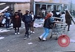 Image of looting of Wolfe Bros. furniture store during riots Washington DC USA, 1968, second 25 stock footage video 65675070916